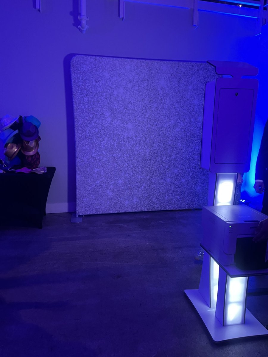 Sparkle backdrop and uplighting for the photo booth at Porter Ridge prom