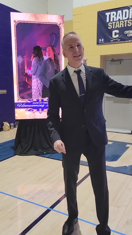 Homecoming 360 booth playing back life-size on an LED video column