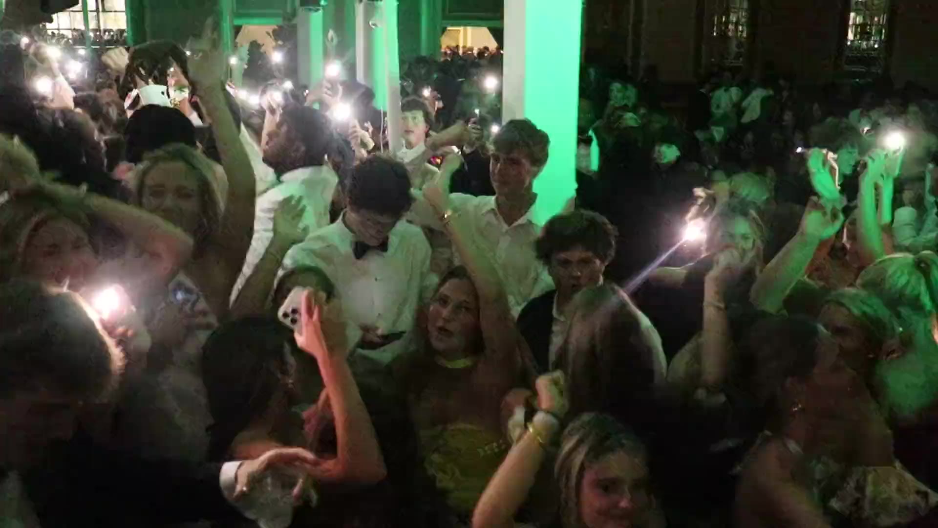Teens dancing under ATG party lighting at a Charlotte celebration