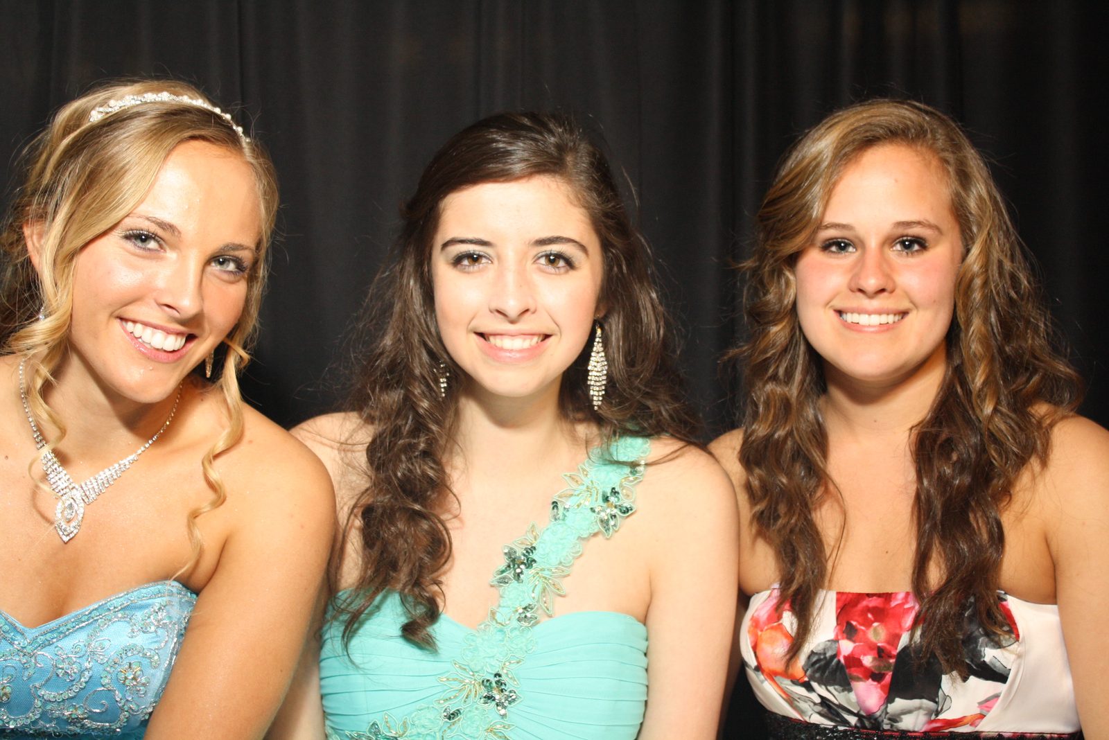 Students in the ATG photo booth at the 2012 Providence High School prom