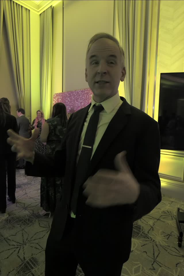 Brian Hines shows off the ATG photo booth at Carmel Country Club