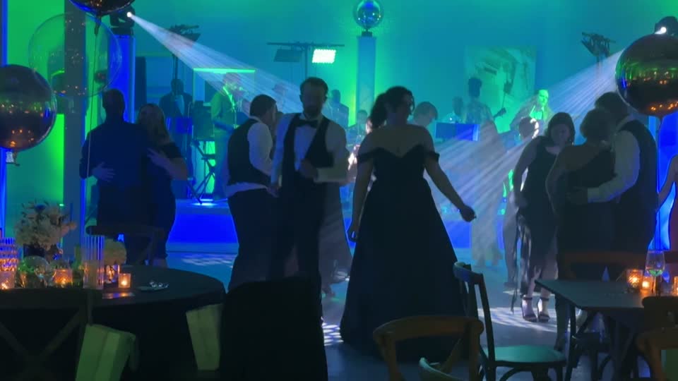 Packed dance floor at a prom at The Casey