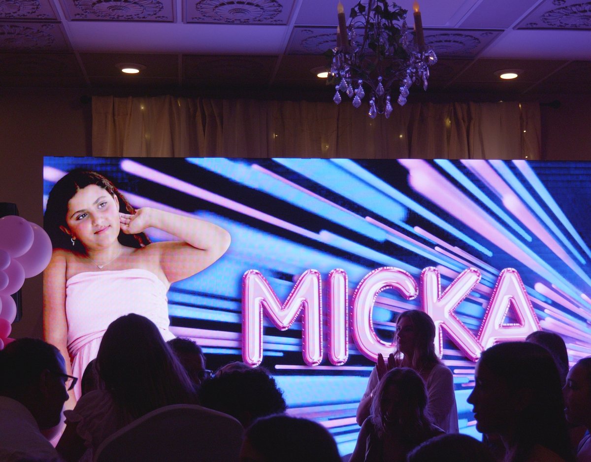 Guest of honor on a giant LED wall above the dance floor